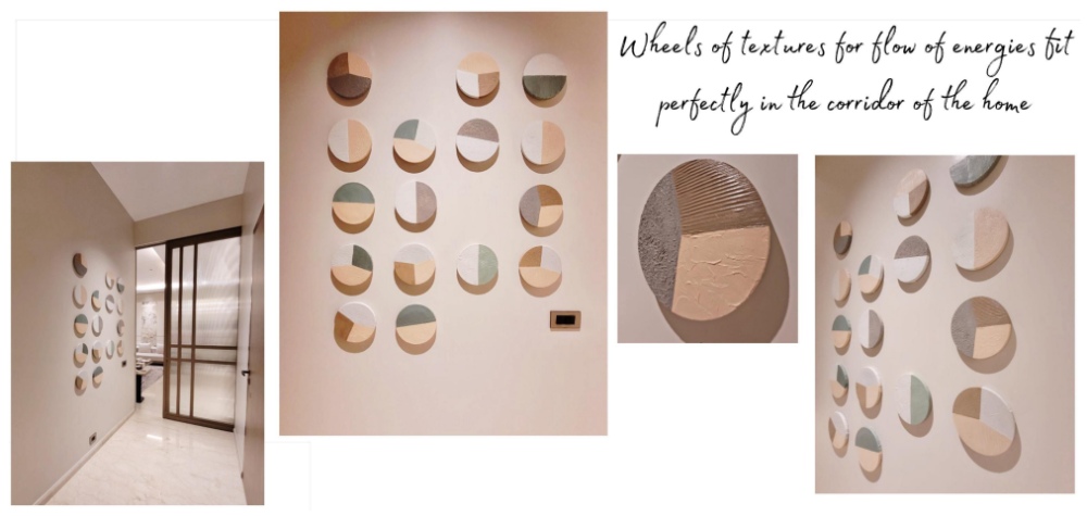 Textured circular wall artworks installed in a residential corridor, creating a calm and flowing visual experience.